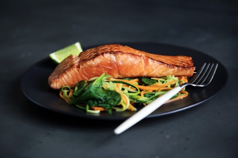 Pan-seared fish fillet with fresh salad